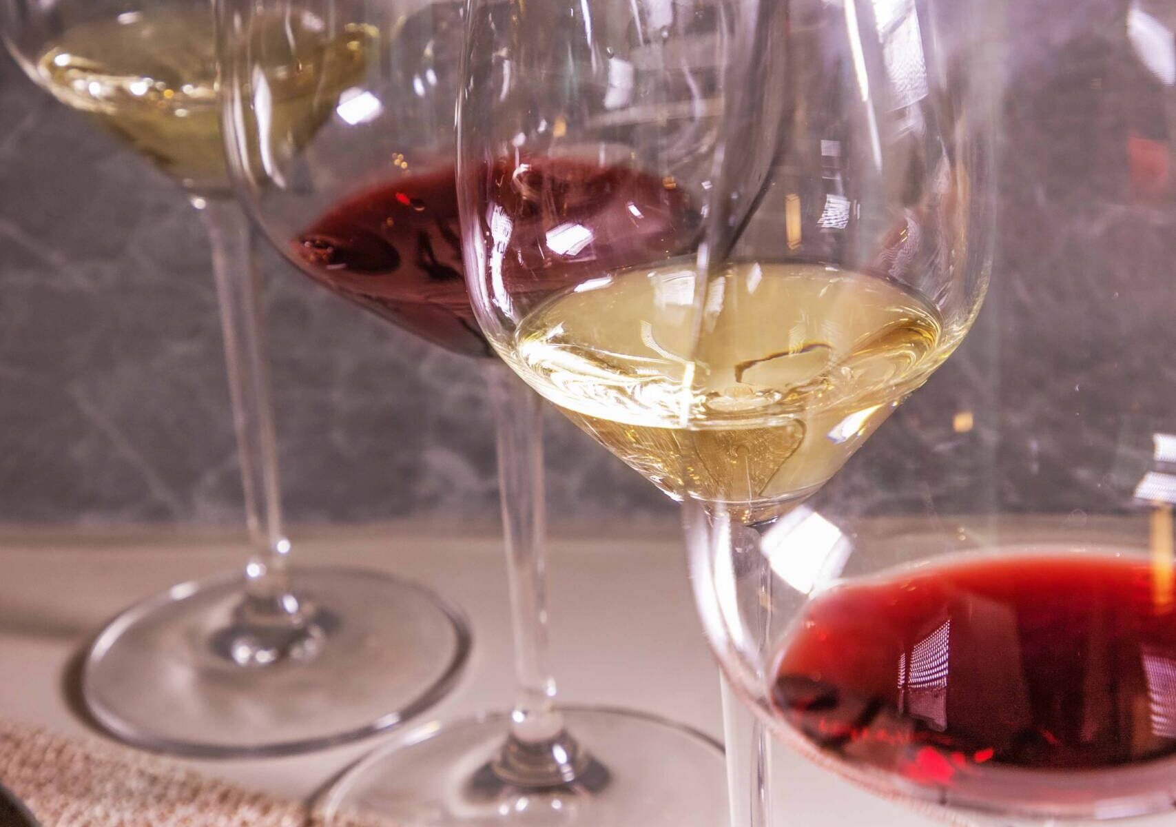 enjoy whiskey at happy hour offer by aki mgallery bars and restaurants