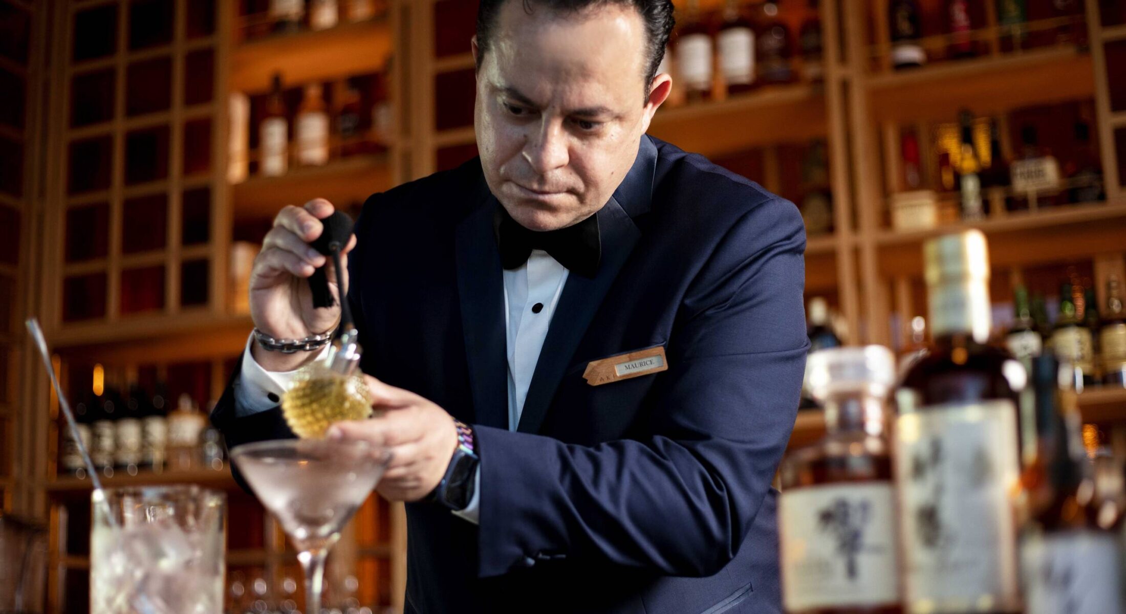 uncle mings bar manager making drinks at best hotels in hong kong